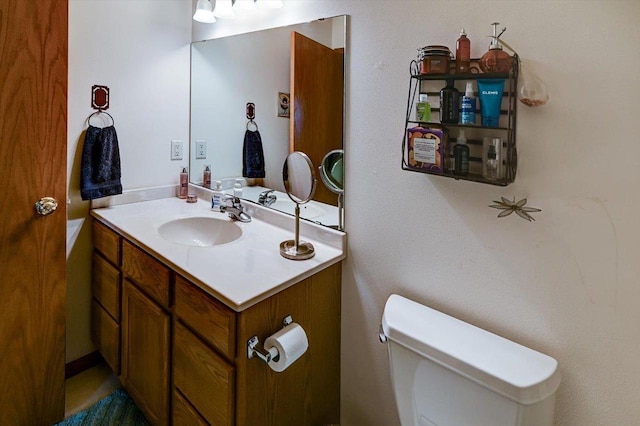half bath with toilet and vanity