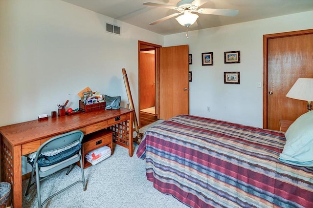 bedroom featuring visible vents, a ceiling fan, and carpet floors