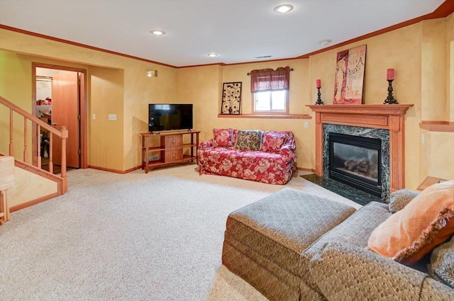 carpeted living room featuring stairs, recessed lighting, crown molding, and a premium fireplace