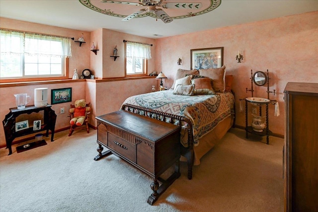 bedroom with carpet floors, baseboards, and visible vents