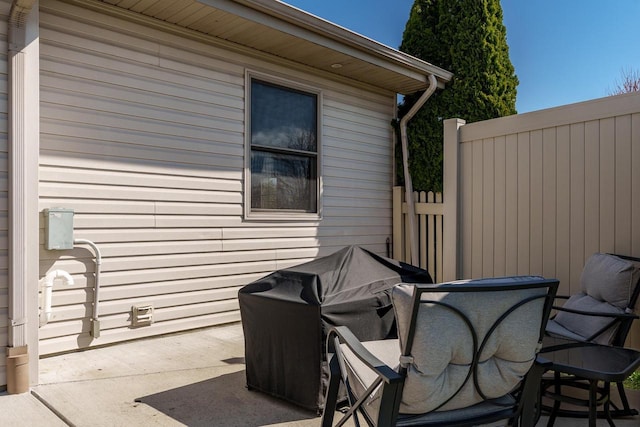 view of patio with fence
