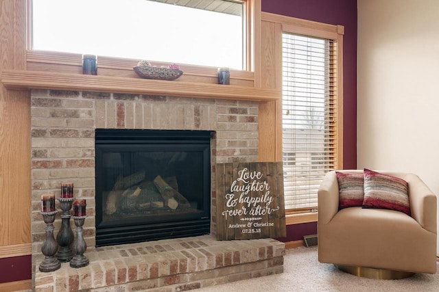 details featuring baseboards and a fireplace