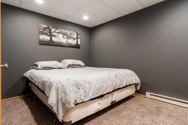 bedroom with baseboards, carpet flooring, baseboard heating, and recessed lighting