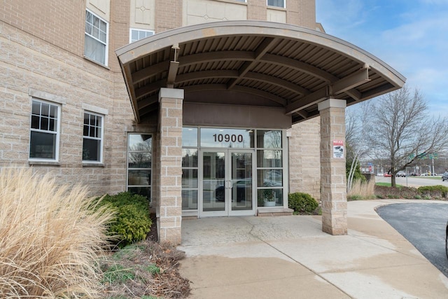 property entrance featuring french doors