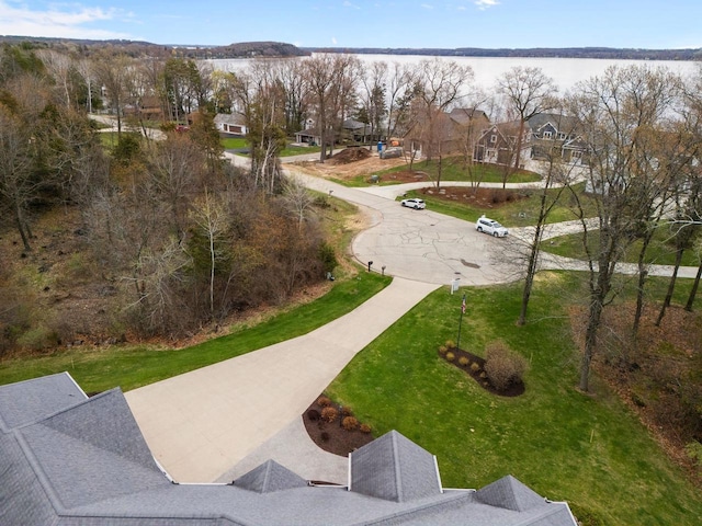 surrounding community featuring a residential view and a water view