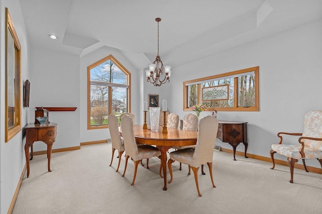 dining space with an inviting chandelier, baseboards, light carpet, and recessed lighting