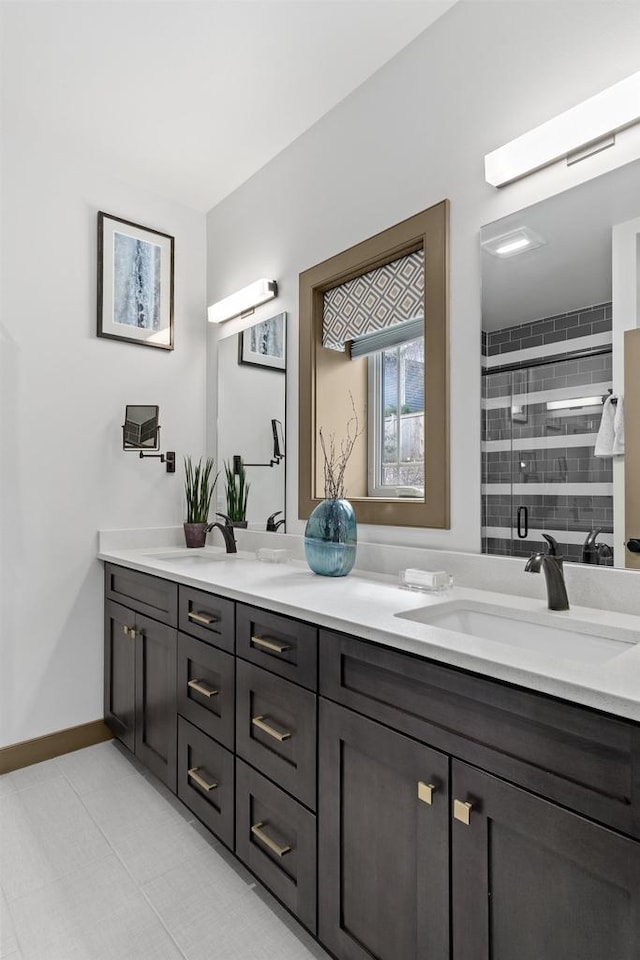 6667 S Chickahauk Trl, Middleton, WI 53562 - full bath featuring a shower stall, double vanity, and baseboards