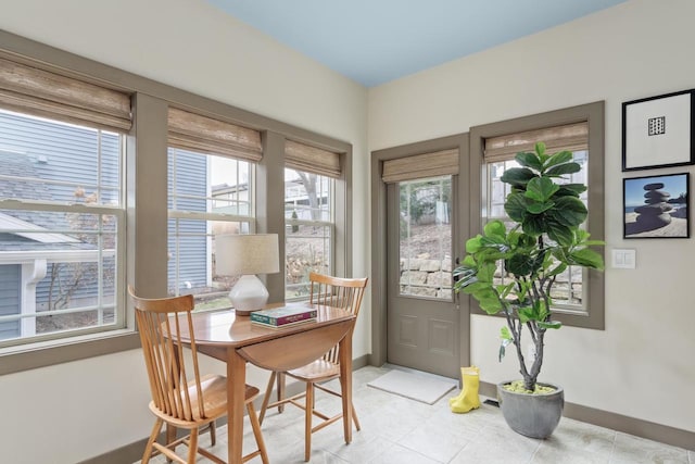 6667 S Chickahauk Trl, Middleton, WI 53562 - dining area with baseboards, light tile patterned floors, and an office area