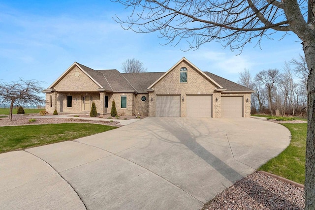 view of front of house with driveway, a front yard, a garage, brick siding, and a shingled roof