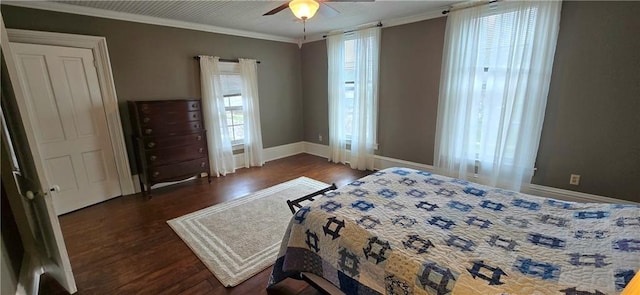 422 W Columbia St, Chippewa Falls, WI 54729 - bedroom with crown molding, baseboards, ceiling fan, and wood finished floors