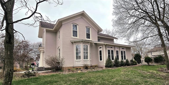 422 W Columbia St, Chippewa Falls, WI 54729 - view of property exterior with a yard