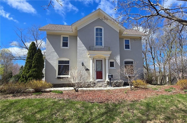 422 W Columbia St, Chippewa Falls, WI 54729 - view of front of home featuring a front yard and stucco siding