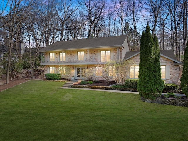 19425 Killarney Way, Brookfield, WI 53045 - view of front of home with brick siding, french doors, and a front lawn