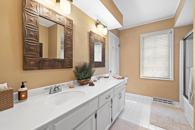 19425 Killarney Way, Brookfield, WI 53045 - full bath featuring a sink, tile patterned floors, double vanity, and visible vents