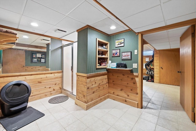 19425 Killarney Way, Brookfield, WI 53045 - bathroom with wooden walls, tile patterned flooring, a stall shower, and recessed lighting