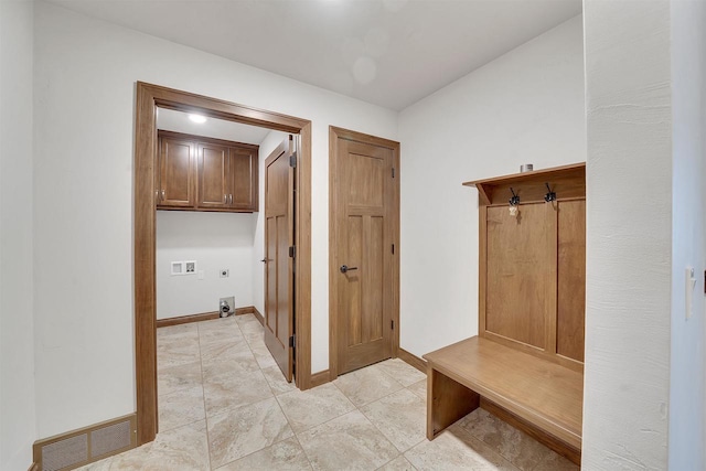 mudroom with baseboards and visible vents