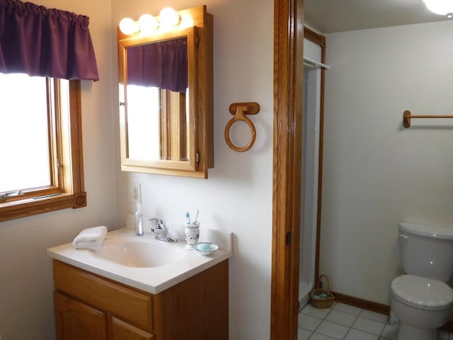 10621 Cth F, Newton, WI 53063 - bathroom with vanity, tile patterned floors, a wealth of natural light, and toilet