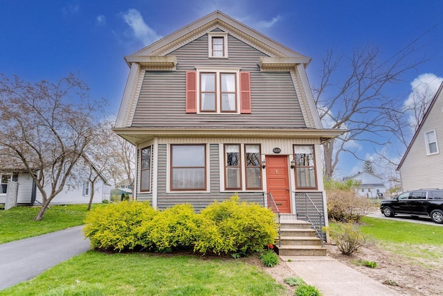 view of front of property with a front lawn