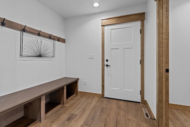 mudroom with recessed lighting, baseboards, visible vents, and wood finished floors