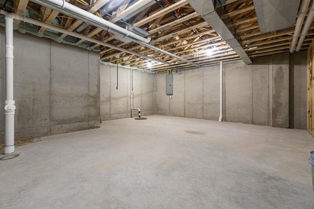 unfinished basement featuring electric panel