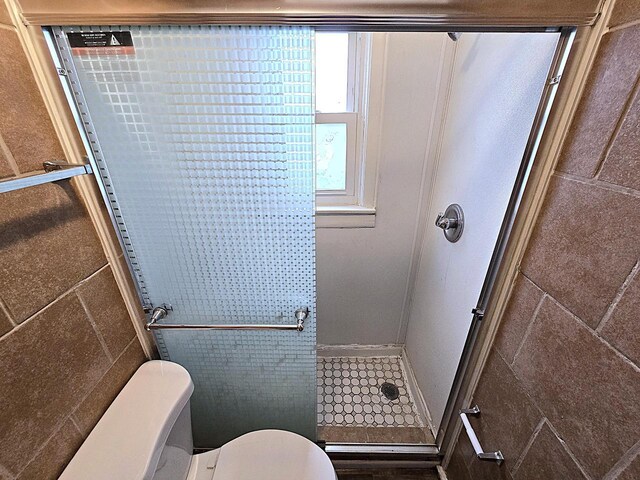 5870 N 72nd St, Milwaukee, WI 53218 - bathroom featuring a stall shower and toilet