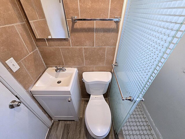 5870 N 72nd St, Milwaukee, WI 53218 - bathroom featuring toilet, a shower, and vanity