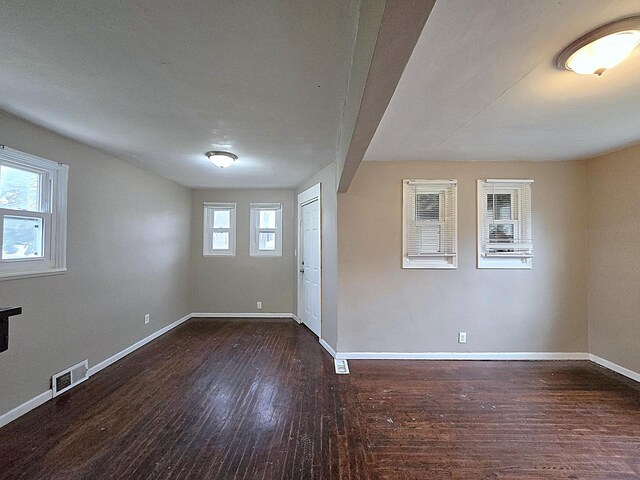 5870 N 72nd St, Milwaukee, WI 53218 - spare room featuring baseboards, visible vents, and hardwood / wood-style flooring