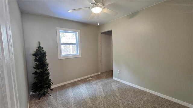 10039 State Highway 27, Hayward, WI 54843 - carpeted empty room featuring a ceiling fan, baseboards, and visible vents