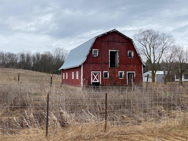 186 Abrahams Rd, Skandia, MI 49885 - view of barn with fence