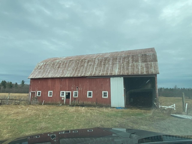 186 Abrahams Rd, Skandia, MI 49885 - view of barn featuring fence