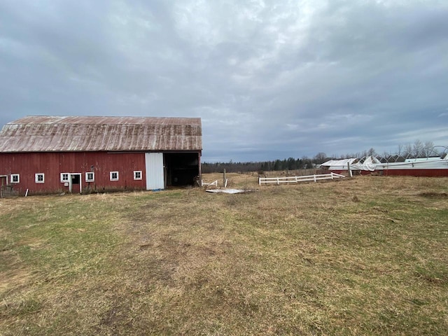 186 Abrahams Rd, Skandia, MI 49885 - view of outbuilding featuring fence and an outdoor structure