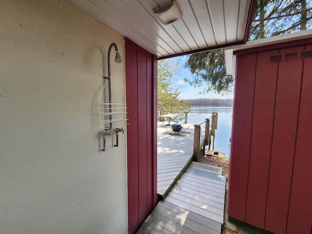 26297 State Highway 60, Lone Rock, WI 53556 - exterior space with a water view and stucco siding