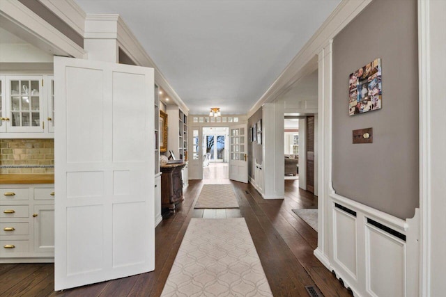 interior space featuring french doors and dark wood-style floors