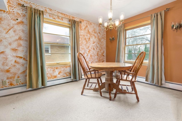 901 E Grant St, Appleton, WI 54911 - dining room with baseboards, a notable chandelier, and wallpapered walls