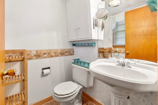 901 E Grant St, Appleton, WI 54911 - half bathroom featuring a sink and toilet