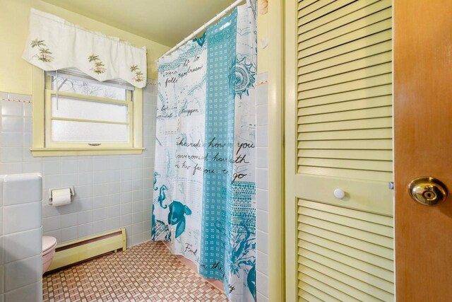 901 E Grant St, Appleton, WI 54911 - full bath with toilet, tile walls, curtained shower, and baseboard heating