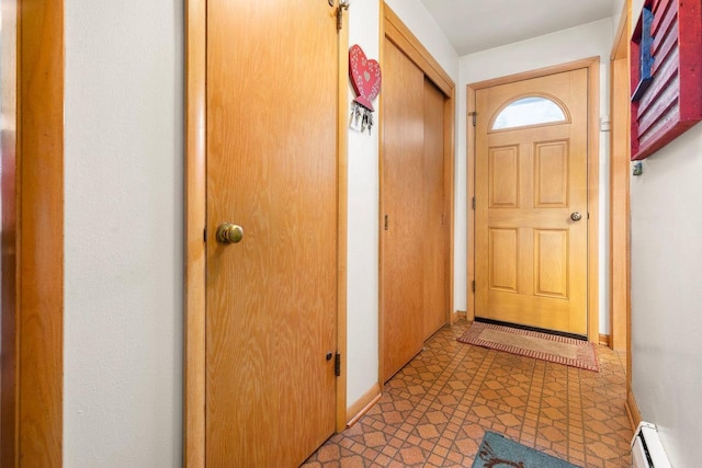 901 E Grant St, Appleton, WI 54911 - doorway to outside featuring a baseboard radiator