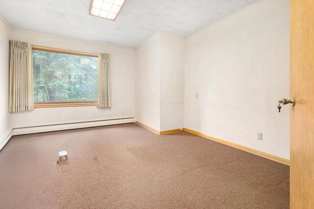 901 E Grant St, Appleton, WI 54911 - empty room featuring carpet, baseboards, and baseboard heating
