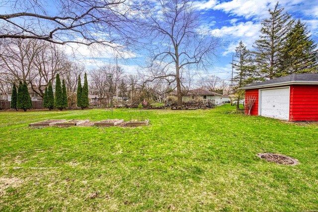901 E Grant St, Appleton, WI 54911 - view of yard with a detached garage and an outbuilding