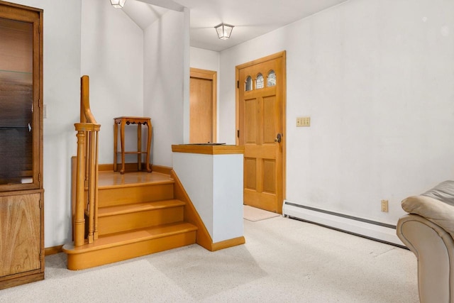 901 E Grant St, Appleton, WI 54911 - carpeted foyer with baseboards and a baseboard radiator