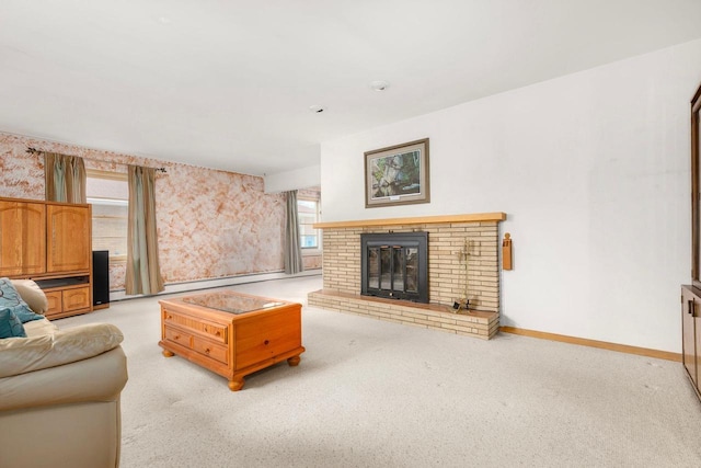 901 E Grant St, Appleton, WI 54911 - living area with wallpapered walls, light carpet, baseboards, and a fireplace