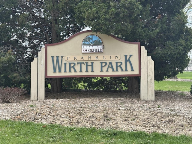 community sign with a carport
