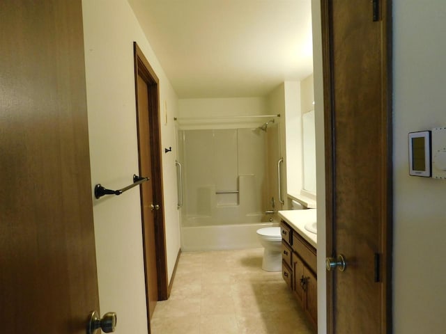 bathroom with vanity, shower / bathing tub combination, tile patterned floors, and toilet