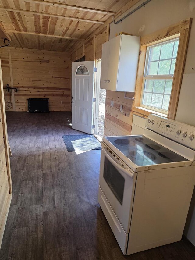 W10686 County Road X, Crivitz, WI 54114 - kitchen featuring dark wood-style flooring, wooden ceiling, white cabinets, wooden walls, and white electric range oven
