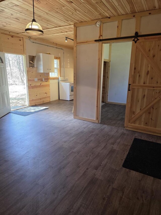 W10686 County Road X, Crivitz, WI 54114 - unfurnished living room with wooden ceiling, separate washer and dryer, and wood finished floors