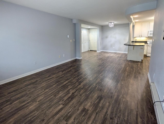 unfurnished living room with baseboards, a baseboard radiator, and dark wood-style floors