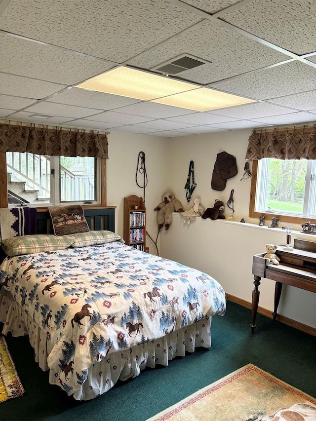 5021 Margaret Dr, Amherst, WI 54406 - carpeted bedroom with a drop ceiling and baseboards