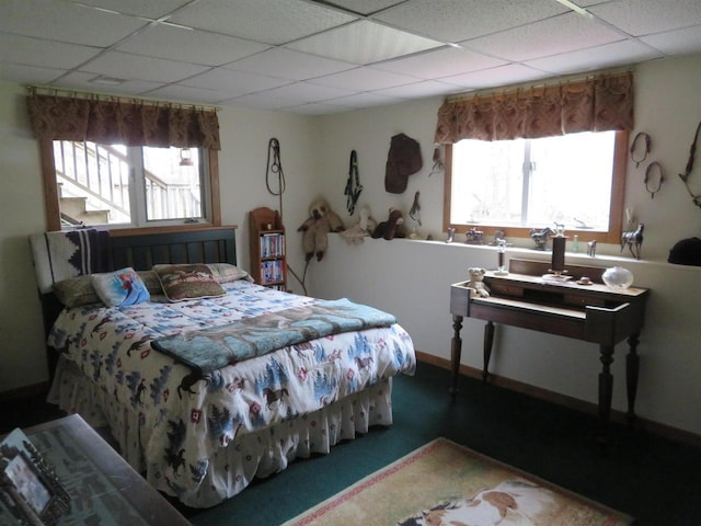 5021 Margaret Dr, Amherst, WI 54406 - bedroom with a paneled ceiling and baseboards