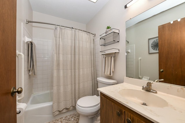 bathroom with vanity, shower / tub combo, and toilet