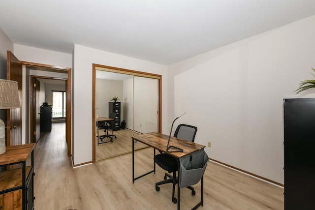 office with light wood-style floors